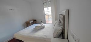 Posteľ alebo postele v izbe v ubytovaní Mercado Cee Galitrips Apartment