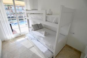 Posteľ alebo postele v izbe v ubytovaní Mirador al Mar 87 by homeprive + 20 fotografií
