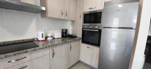 Kuchyňa alebo kuchynka v ubytovaní Mercado Cee Galitrips Apartment