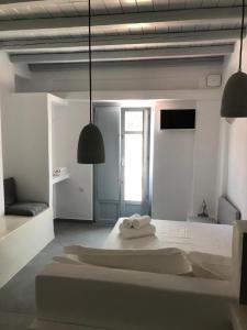Katil atau katil-katil dalam bilik di Theros Apartments Donoussa