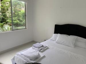 Postel nebo postele na pokoji v ubytování Mango Home