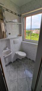 Kúpeľňa v ubytovaní Apartament Hexagon nr 21