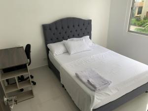 Postel nebo postele na pokoji v ubytování Mango Home
