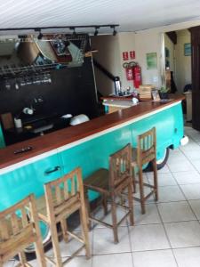 Kuchyň nebo kuchyňský kout v ubytování Pousada Reserva do Tombo Lounge Hostel