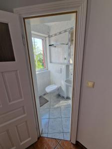 Kúpeľňa v ubytovaní Apartament Hexagon nr 14 + 15 fotografií