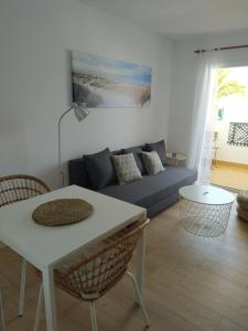Posedenie v ubytovaní Apartment AYALGA - Pool view - Good Wifi - Smart TV-Residence Dunia IV