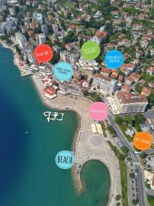 a map of a city with buildings and the water at Apartments Liburnija in Opatija
