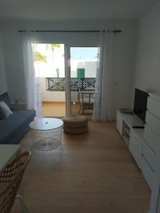 Posedenie v ubytovaní Apartment AYALGA - Pool view - Good Wifi - Smart TV-Residence Dunia IV