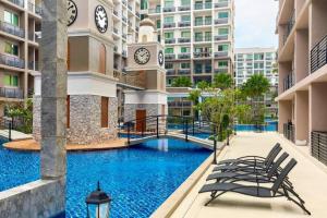 Fotografie z fotogalerie ubytování Exclusive Arcadia Condo - Amazing Pools & Gardens, Gym, Sauna, Waterfalls, Jacuzzi, Fast Internet v destinaci Pattaya South