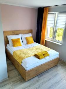 Posteľ alebo postele v izbe v ubytovaní Apartament Luxusowe Karkonosze