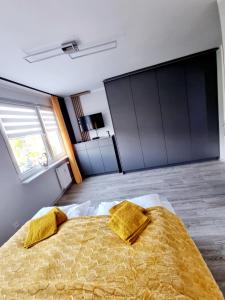 Posteľ alebo postele v izbe v ubytovaní Apartament Luxusowe Karkonosze