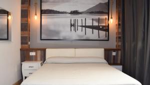 Posteľ alebo postele v izbe v ubytovaní Hotel Mirablau