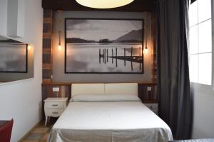 Posteľ alebo postele v izbe v ubytovaní Hotel Mirablau
