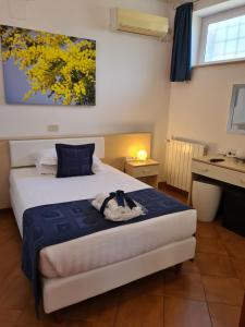 Postel nebo postele na pokoji v ubytování Albis Rooms Guest House