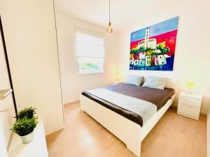 Postel nebo postele na pokoji v ubytování Anapartments2