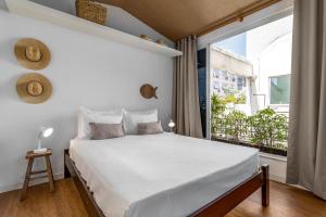 Кровать или кровати в номере Cobertura em Ipanema - Vista oceânica - JAC1