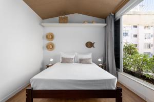 Кровать или кровати в номере Cobertura em Ipanema - Vista oceânica - JAC1