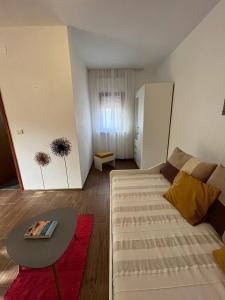 Postel nebo postele na pokoji v ubytování Studio apartman SAN 3