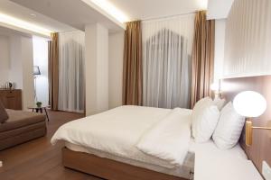 Hotel Freya客房内的一张或多张床位