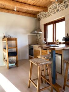 Η κουζίνα ή μικρή κουζίνα στο Meraki Apartments Crete