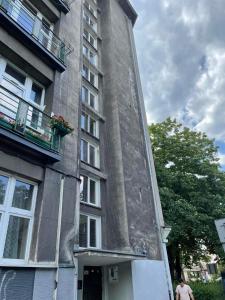 Budova, v ktorej sa apartmán nachádza + 10 fotografií