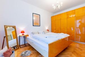 Postel nebo postele na pokoji v ubytování Marinero Apartment