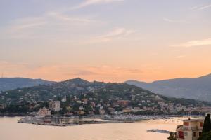 a city on a hill next to a body of water at Grand Hotel Bristol Spa Resort, by R Collection Hotels in Rapallo