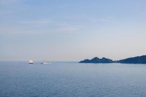 a large body of water with a boat in it at Grand Hotel Bristol Spa Resort, by R Collection Hotels in Rapallo