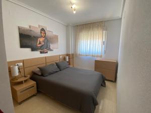 Posteľ alebo postele v izbe v ubytovaní APARTAMENTO ZONA MARINADOR, CERCA A LA PLAYA