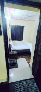 Katil atau katil-katil dalam bilik di Hotel curio's All seasons