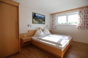 Cama o camas de una habitación en Haus Lienbacher