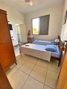 Postel nebo postele na pokoji v ubytování Hotel Sorrento