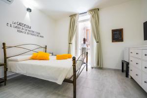 Postel nebo postele na pokoji v ubytování Casa Mirto