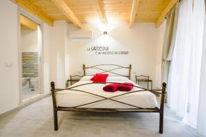 Postel nebo postele na pokoji v ubytování Casa Mirto