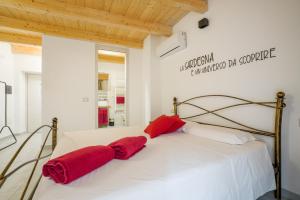 Postel nebo postele na pokoji v ubytování Casa Mirto