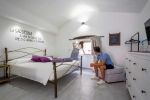 Postel nebo postele na pokoji v ubytování Casa Mirto