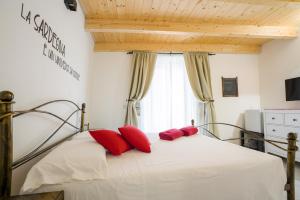Postel nebo postele na pokoji v ubytování Casa Mirto