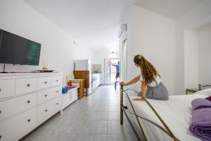 TV a/nebo společenská místnost v ubytování Casa Mirto