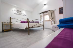 Postel nebo postele na pokoji v ubytování Casa Mirto