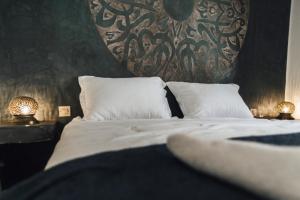 Postel nebo postele na pokoji v ubytování La Casa Ysabella