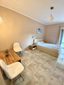 Posteľ alebo postele v izbe v ubytovaní Apartments NANA