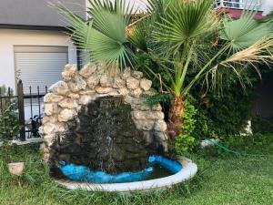 Vonkajšia záhrada v ubytovaní Apartments NANA