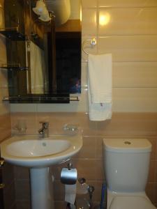 Vonios kambarys apgyvendinimo įstaigoje Hotel Klea