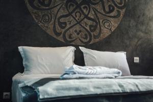 Postel nebo postele na pokoji v ubytování La Casa Ysabella