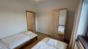 Posteľ alebo postele v izbe v ubytovaní Apartamenty Starowiejska 39, Ryczów - 10km od Zator Energylandia