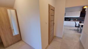 Kuchyňa alebo kuchynka v ubytovaní Apartamenty Starowiejska 39, Ryczów - 10km od Zator Energylandia