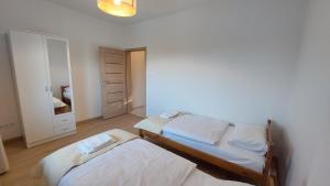 Posteľ alebo postele v izbe v ubytovaní Apartamenty Starowiejska 39, Ryczów - 10km od Zator Energylandia
