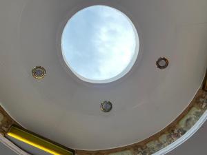a circular window in the ceiling of a room at City-Kesselhaus-Stendal in Stendal