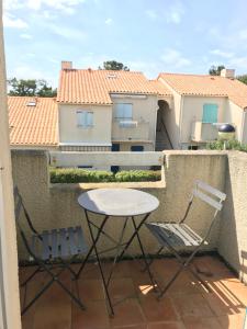 Balkón nebo terasa v ubytování Joli appartement en résidence proche de la plage + 1 fotografie