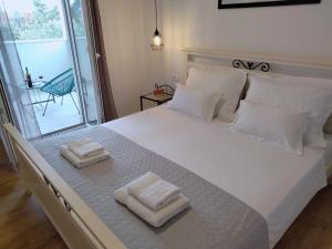 Posteľ alebo postele v izbe v ubytovaní Villa Cutty sark